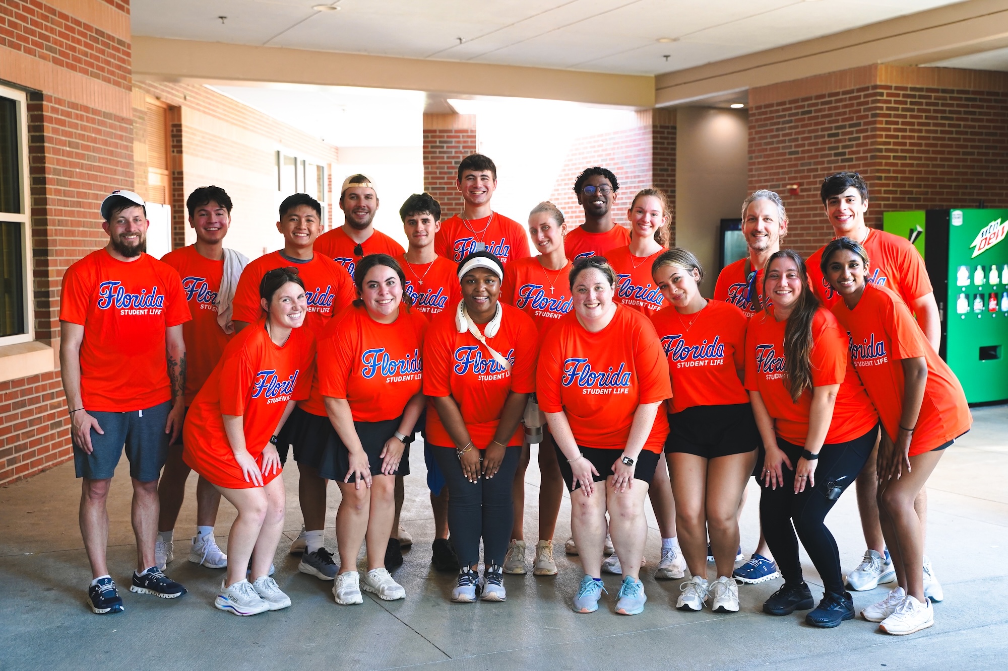 Student Engagement staff and student volunteers at Fall 2025 move-in smiling for a photo.